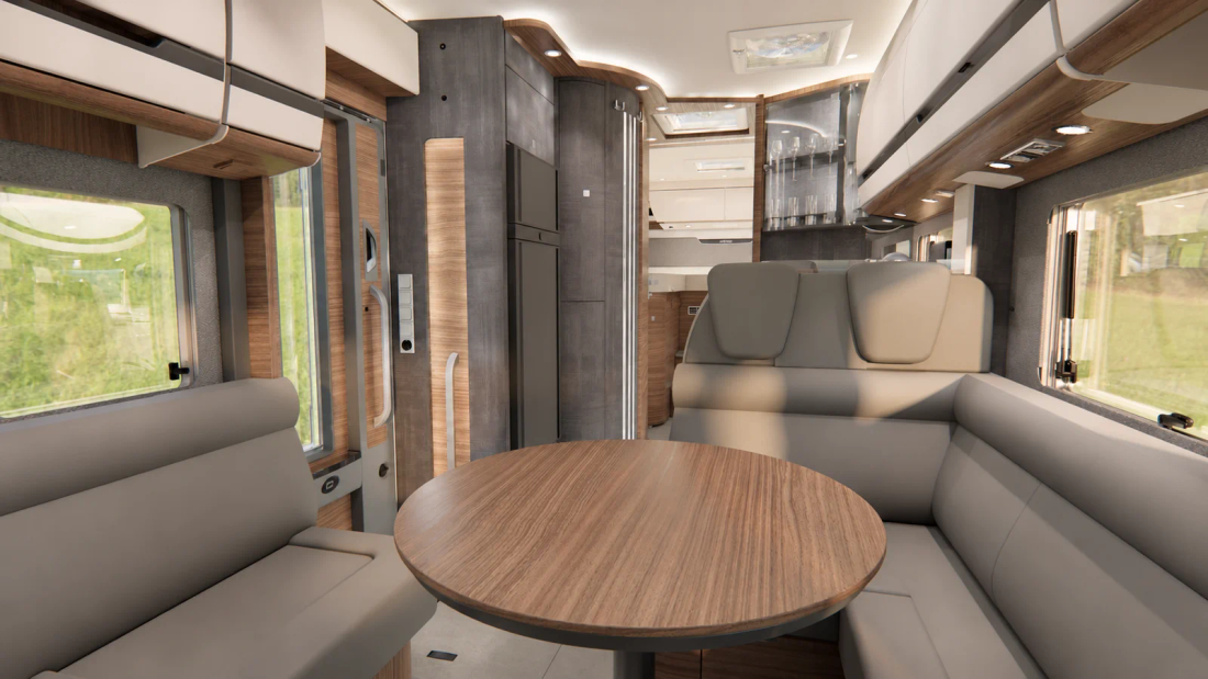 Salon du Carthago chic e-line I 50 LE Cortina vu depuis la cabine vers la cuisine et la chambre